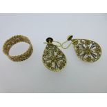 A pair of Spanish filigree work pendant earrings and a similar style band ring, each earring hook