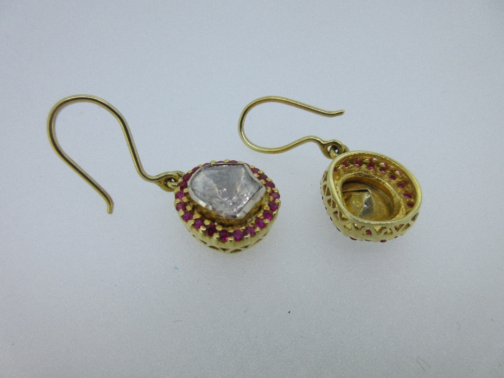 A silver gilt ruby and diamond cluster ring and earpendant suite, the ring rub over set with a - Image 6 of 8