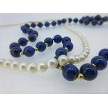 A lapis lazuli bead necklace together with a cultured pearl necklace, the uniform 8mm lapis lazuli