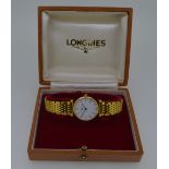 Longines - A lady's yellow PVD coated 'La Grande Classique' wristwatch, the signed circular white