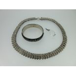 A Victorian fringe collar necklace, together with an Austro-Hungarian enamel hinged bangle and a