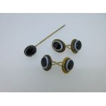A pair of antique banded onyx double ended cufflinks together with a similarly set stickpin, each