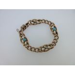 A rose coloured bracelet set with turquoise and seed pearls, the hollow curb chain links spaced with