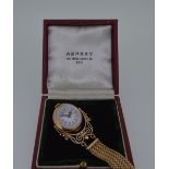 A skeleton ball pendant watch cased by Asprey, the unsigned circular white enamel dial, 20mm