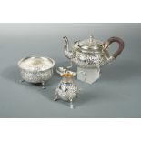 A Victorian silver bachelor's three piece tea set, by William Davenport, Birmingham 1896, the