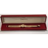 Omega - A lady's 9ct gold wristwatch, circa 1972, the circular signed champagne dial, 15mm diameter,