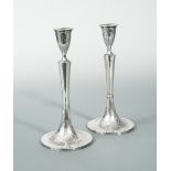 A pair of Austrian metalwares table candlesticks, maker's mark not traced, Lubiana 1802, 13 loth (