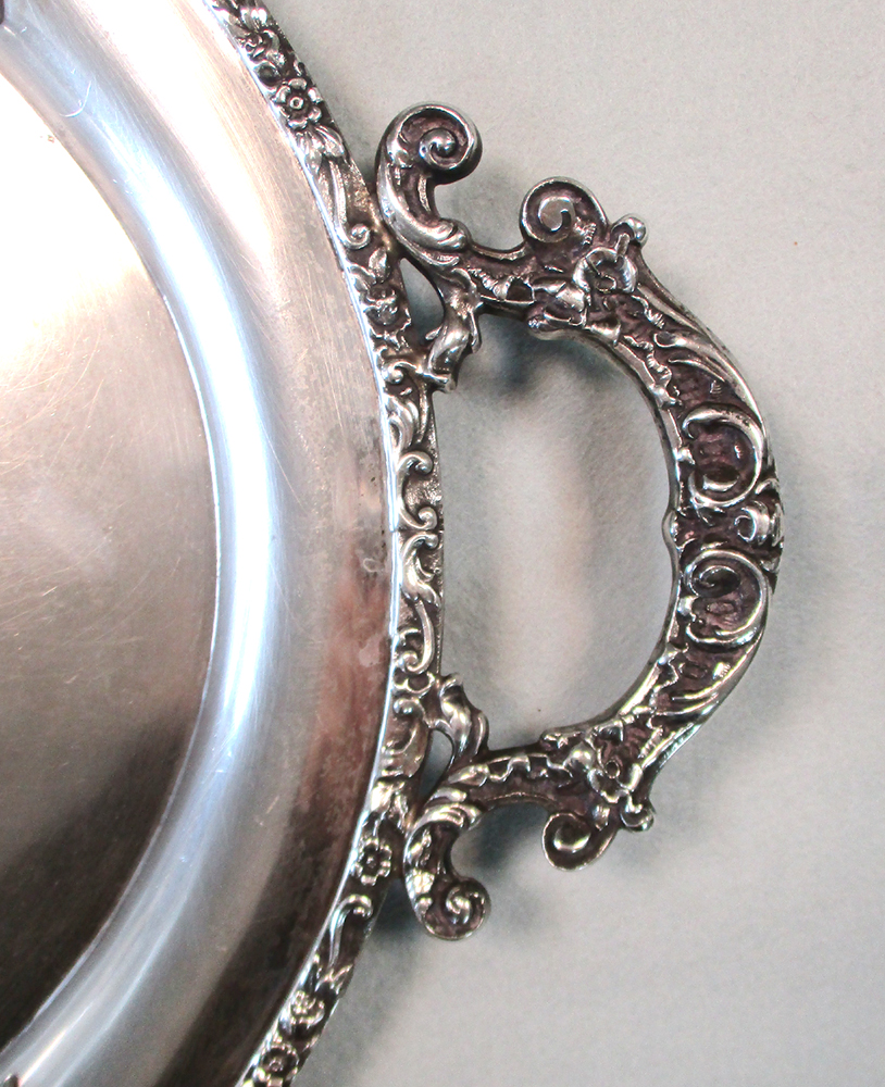 A German metalwares oval tray, by Handarbeit, with floral border and two applied scrolling - Image 2 of 5