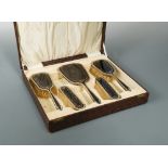 A George V silver and tortoiseshell dressing table set, by Collett & Anderson, London 1931,