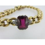 A garnet and diamond set bracelet, the hollow curb link bracelet with push in box snap and safety