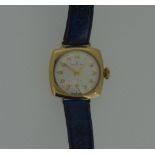 Zenith - A lady's 9ct gold wristwatch, circa 1961, the signed circular cream coloured dial, 18mm