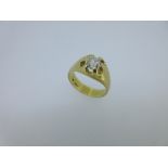A single stone diamond ring, the claw set 'old' cut diamond of approximately 1.10ct with scalloped
