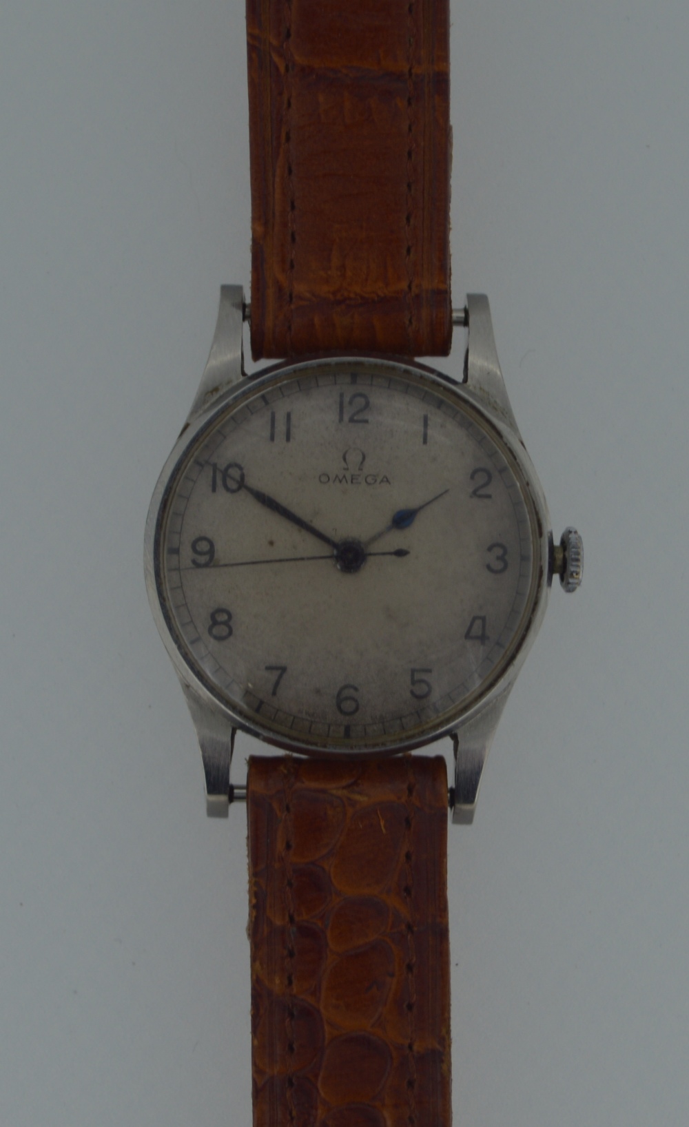 Omega - An Air Ministry gentleman's steel wristwatch, circa 1940, the signed circular off white