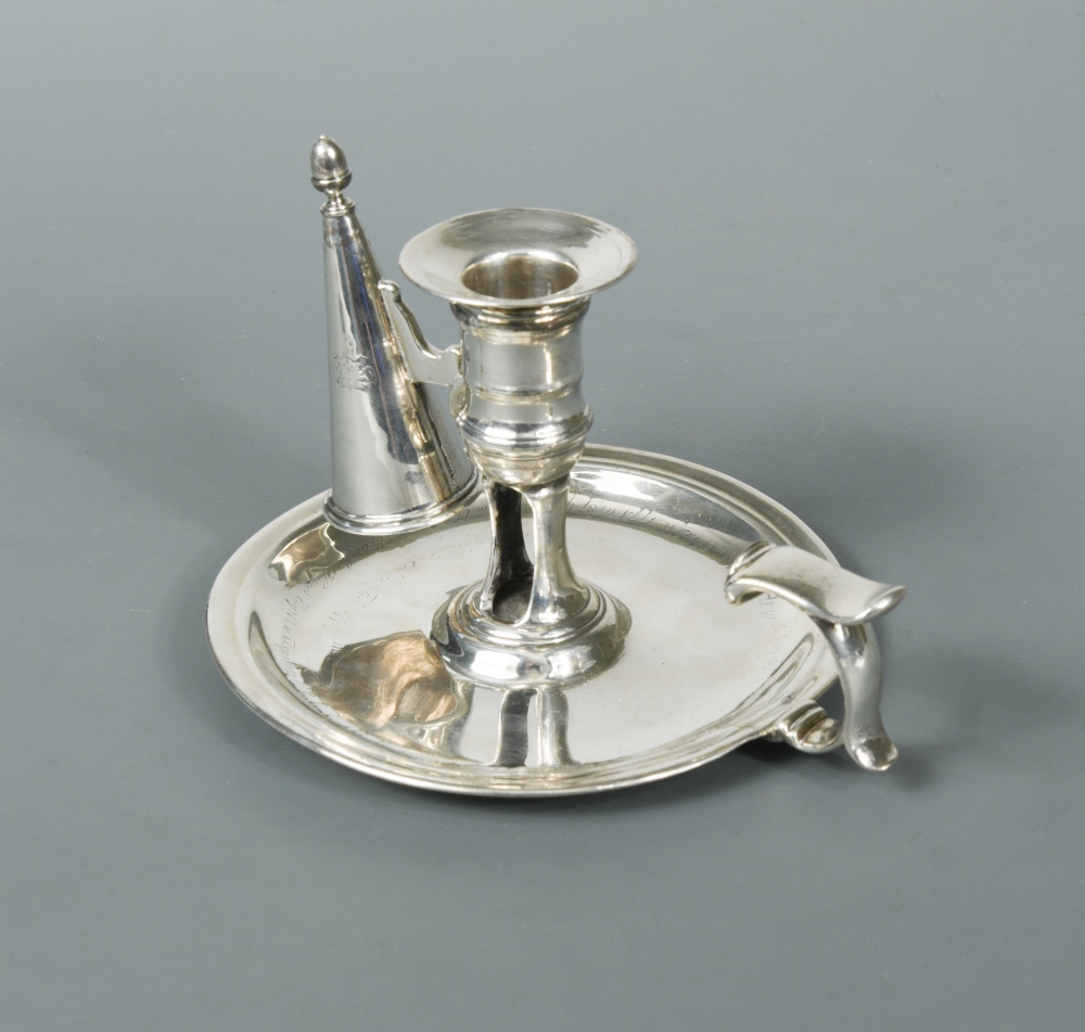 A George II silver chamberstick with a later snuffer, by Jas Gould, London 1736, of traditional