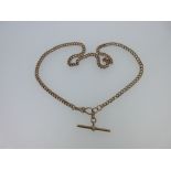 A Victorian 9ct rose gold watch 'Albert' chain, each curb link stamped '9 .375', with swivel catch