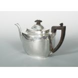 A George III silver teapot, probably by William Bennett, London 1806, of very plain rectangular