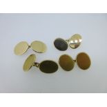 Two similar pairs of 18ct gold double-ended cufflinks, both with plain oval flat plaques and chain