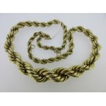 A graduating hollow rope link necklace, 13mm at the centre, tapering to 5mm, to a bolt ring clasp,