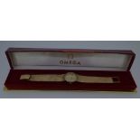 Omega - A lady's 9ct gold wristwatch, circa 1969, the circular signed champagne dial, 20mm diameter,