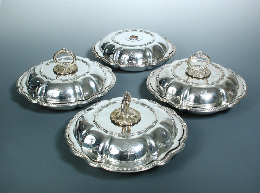 Four Victorian silver entrée dishes and covers, three bases possibly by Creswick & Co, Sheffield