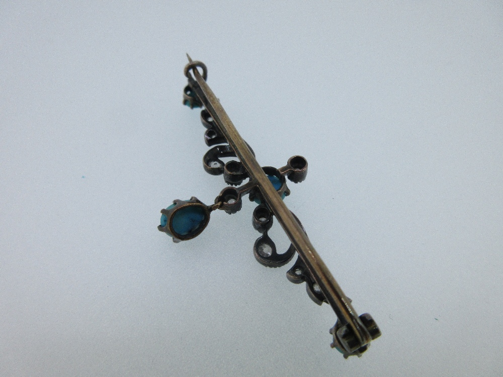 A turquoise and diamond bar brooch, the claw set oval cabochon turquoise with a crimp collet set old - Image 2 of 5