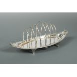 A Victorian silver toast rack, by Walker and Hall, Sheffield 1894, 6 bar, the part marked rack of