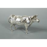 A Victorian silver semi-naturalistic cow creamer, probably by Maurice Freeman, London 1899, of plain
