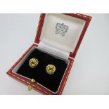 Cartier - A pair of 18ct gold knot earrings in the original case, each a triple knot of two thick