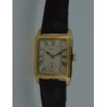 Rolex - A 9ct gold gentleman's wristwatch, circa 1930, the signed rectangular parchment coloured