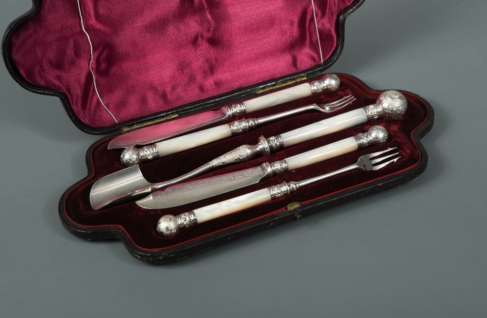 A silver plated cheese and pickle flatware set, by Martin Hall & Co of Sheffield, comprising a