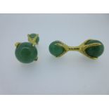 A pair of contemporary green hardstone cufflinks, each with a 12mm polished green hardstone bead