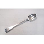 A George III silver basting spoon, by Thomas Johnson, London 1812, 'Fiddle' pattern, 4.7ozt 31cm (