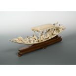 A Cantonese ivory boat with female passengers, Republic period, finely carved with apsara ladies