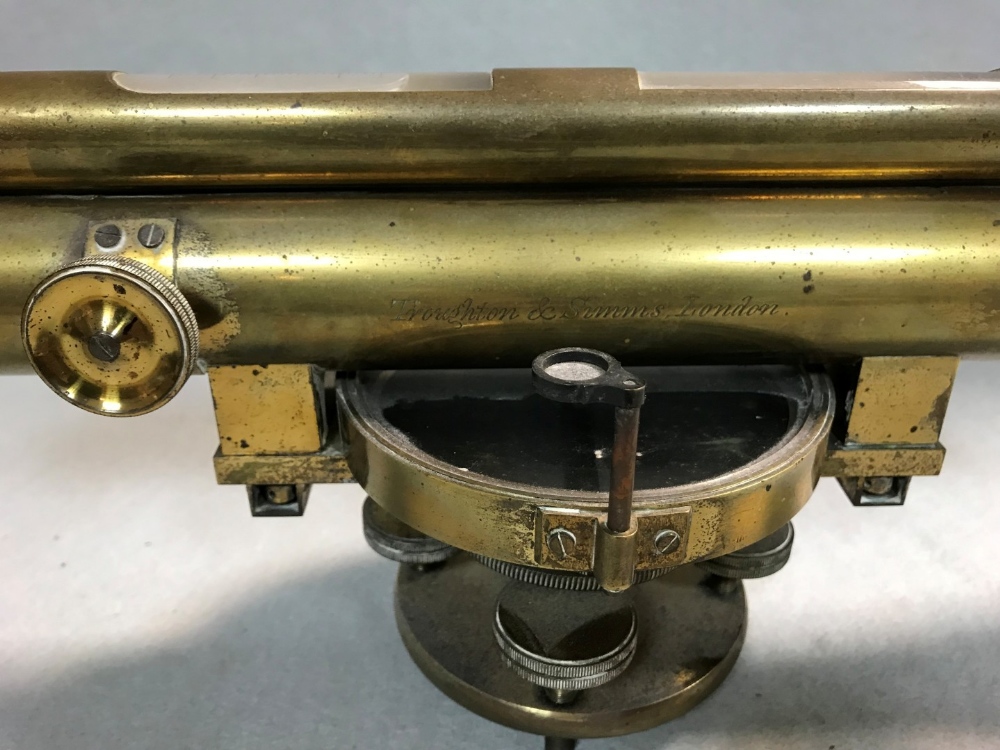 A lacquered brass surveying level by Troughton & Simms, London, late 19th century, 14inch main tube,