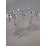 A set of four Irish glass table lustres, each with detachable tops supporting six prismatic drops