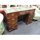 A suite of mahogany and brass 'Campaign' style furniture