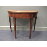 A Sheraton mahogany card table 90cm wide