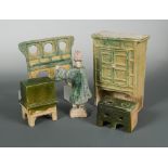 A set of model furniture - a cupboard, stove, chest, and screen with one servant, Ming dynasty,