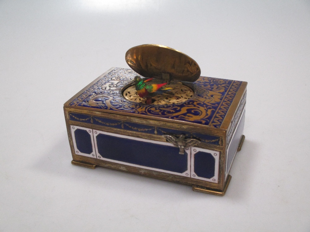 A Continental clockwork enamel cased singing bird automaton