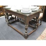 An oak refectory table, on stretchered turned legs H73cm W118cm D65cm