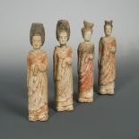 A group of four terracotta figures of ladies, comprising a pair of Northern Wei dynasty court ladies