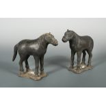 A pair of Yuan or early Ming dynasty horses, in black terracotta, (one with broken tail), 20cm