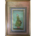 Mughal School, Standing figure of an officer within a decorative border, dating from the period of