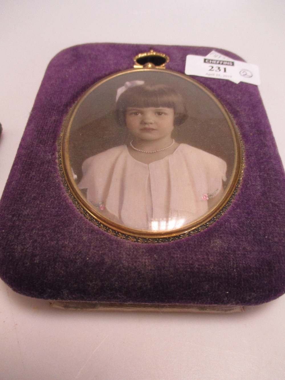 An early Victorian photograph of a young girl, in tooled leather folding frame, together with an - Image 3 of 3