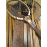 Rugby school cap and badge, vintage cricket stumps and bat, tennis rackets and a lacrosse racket