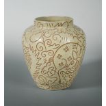 An early 20th century studio pottery vase, possibly French, the ovoid form incised with a stag and