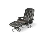 Ekornes, Norway, a leather and chrome lounge chair and footstool, raised on a chrome spoked circular