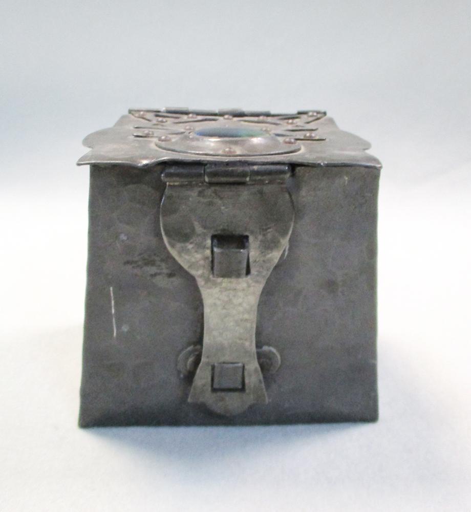 An Arts & Crafts pewter box or tea caddy with enamel cabochon, the repoussé box with applied strap - Image 3 of 5