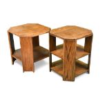 A matched pair of Heal's style oak book tables, both of square form with canted sides and undertiers