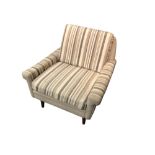 Svensson Skipper, a cream wool upholstered lounge chair, the angled back and arms on tapering